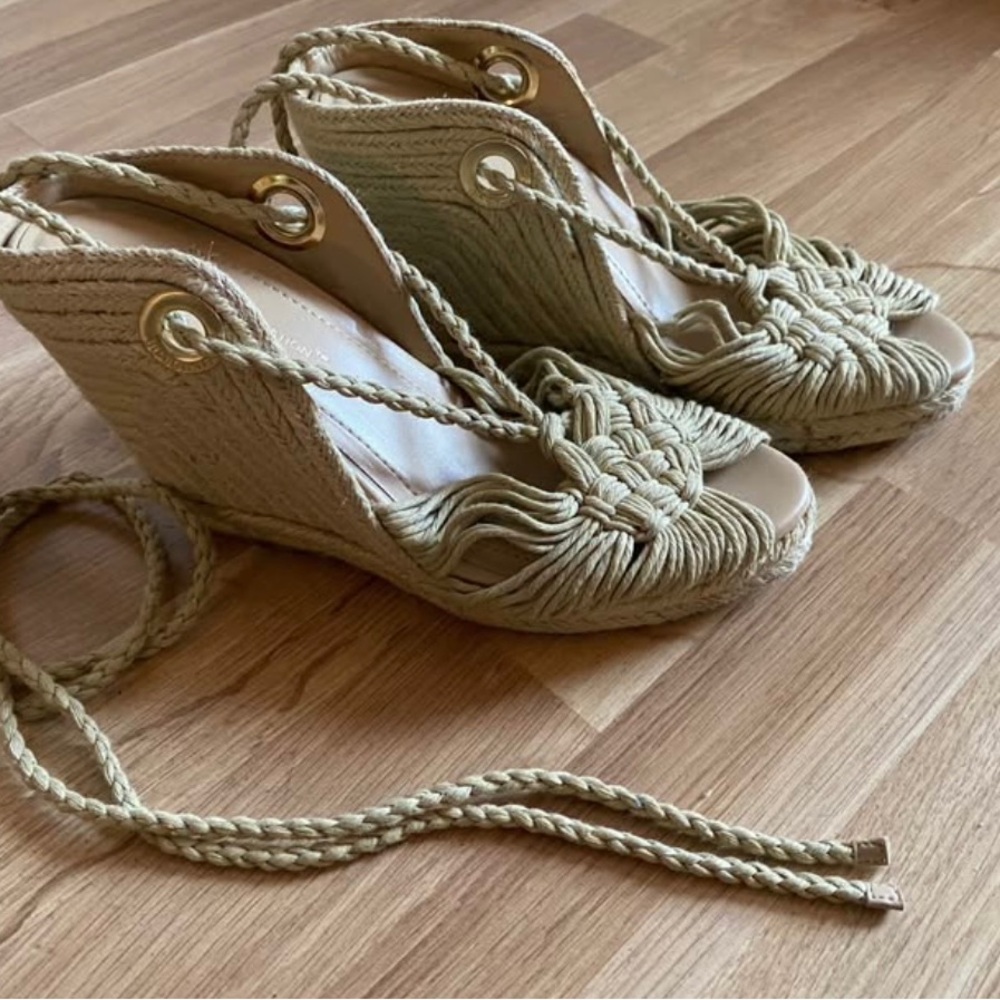 BCBGeneration Cream Tan Wedge Sandals with Intricate Cutout Design